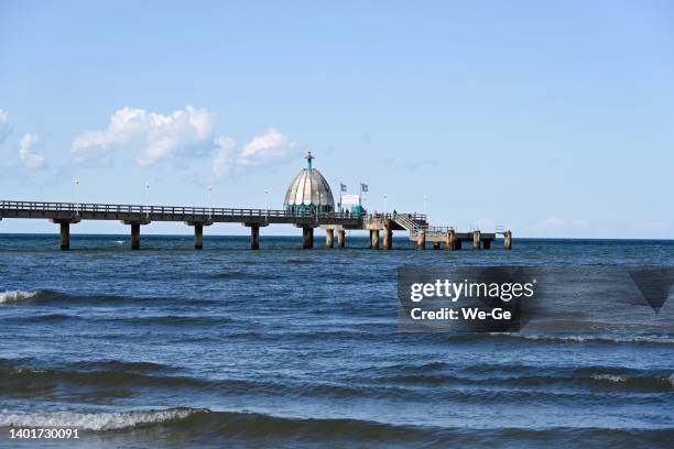 the pier in zinnowitz with diving bell on usedom - zinnowitz stock pictures, royalty-free photos & images