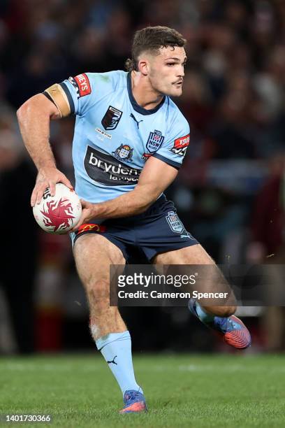 Nathan Cleary of the Blues runs the ball during game one of the 2022 State of Origin series between the New South Wales Blues and the Queensland...