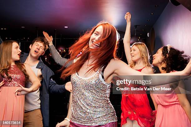 Dancing In Party People Dancing Partying In Nightclub High-Res Stock Photo - Getty Images