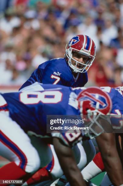Doug Flutie, Quarterback for the Buffalo Bills calls the play on the line of scrimmage during the American Football Conference East Division game...