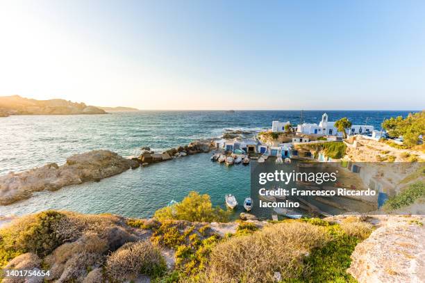 mandraki harbour in milos island, greece - dodecanese islands stock-fotos und bilder