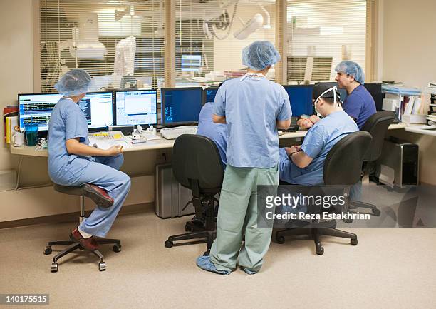 Nurses in discussion surgical preparation room