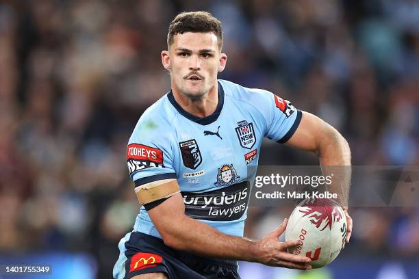 Nathan Cleary of the Blues looks to pass during game one of the 2022 State of Origin series between the New South Wales Blues and the Queensland...
