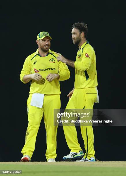 Glenn Maxwell of Australia celebrates with Aaron Finch after taking the wicket Charith Asalanka of Sri Lanka during the 2nd match in the T20...