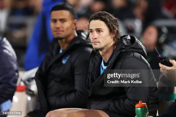 Nicho Hynes of the Blues watches on from the sideline during game one of the 2022 State of Origin series between the New South Wales Blues and the...