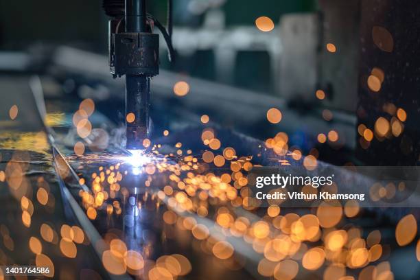 computer numerical control for cutting and weld steel structure at industrial manufacturer. - construction machinery fotografías e imágenes de stock
