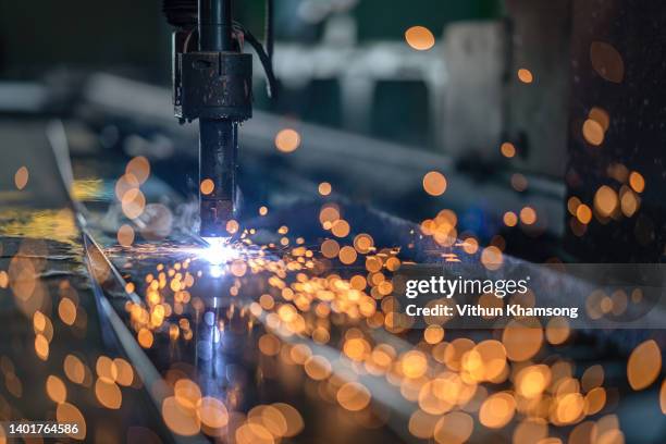 computer numerical control for cutting and weld steel structure at industrial manufacturer. - maquinaria de construcción fotografías e imágenes de stock