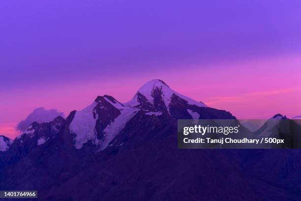 scenic view of snowcapped mountains against sky during sunset - base camp stock pictures, royalty-free photos & images