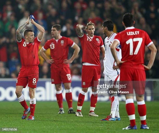 Craig Bellamy of Wales applauds as he is substituted during the Gary Speed Memorial International Match between Wales and Costa Rica at the Cardiff...