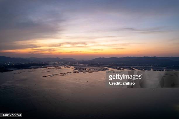 aerial view of the bay in twilight - inlet stock pictures, royalty-free photos & images