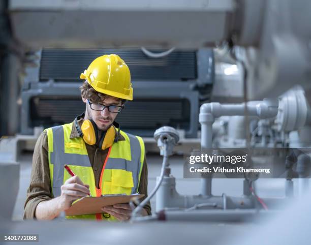 heavy industry engineers working at  manufacturing factory  or power plant. - gas engineer stock pictures, royalty-free photos & images