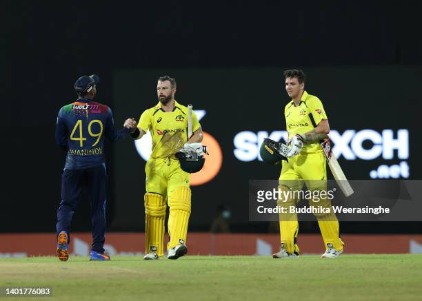 Matthew Wade and Jhye Richardson of Australia congratulated Wanindu de Silva of Sri Lanka after winning the match lead2-0 in the series during the...
