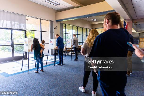 americans voting in an election - political party lines stock pictures, royalty-free photos & images