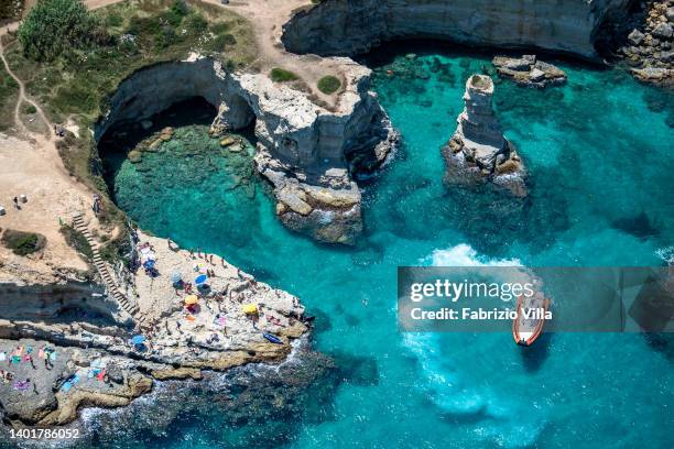 Aerial view from a helicopter of the coastline of Torre dell'Orso, a seaside resort in Salento on July 20, 2019 in Lecce, Italy. Italy's nearly 8000...