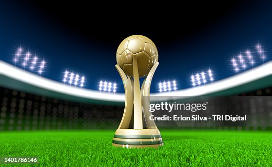 Soccer trophy on stadium lawn with copy space Soccer trophy on stadium lawn with copy space