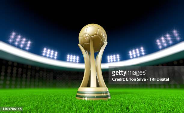 soccer trophy on stadium lawn with copy space - coppa del mondo di calcio foto e immagini stock