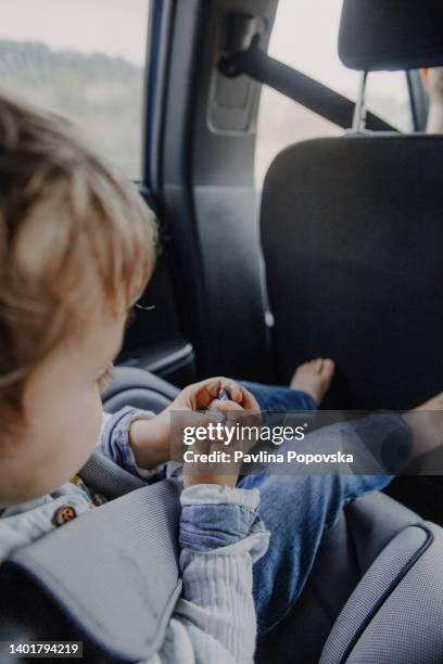 family trip - child car seat stock pictures, royalty-free photos & images