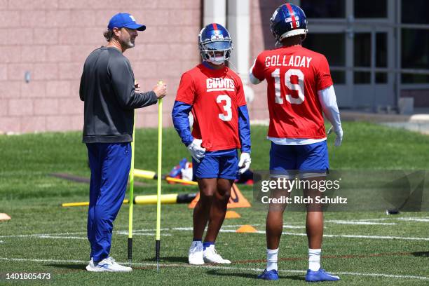 Wide receivers coach Mike Groh talks with receivers Sterling Shepard and Kenny Golladay of the New York Giants during the team's mandatory minicamp...