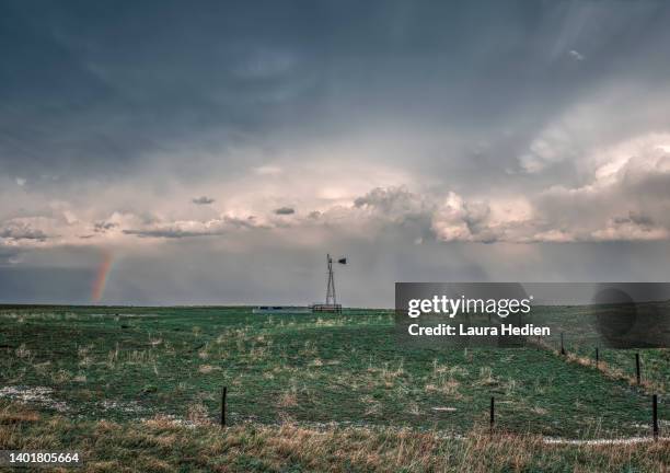 old windmill in the  great plains with storms - mammatus cloud stock pictures, royalty-free photos & images