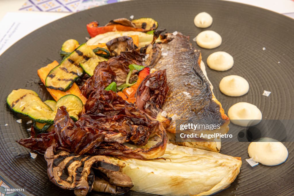 Grilled seabass with vegetables