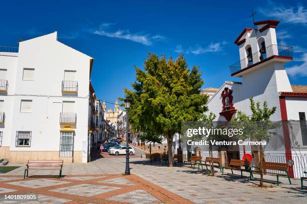 iglesia de la victoria church in olvera - cádiz, spain - poble espanyol stockfoto's en -beelden