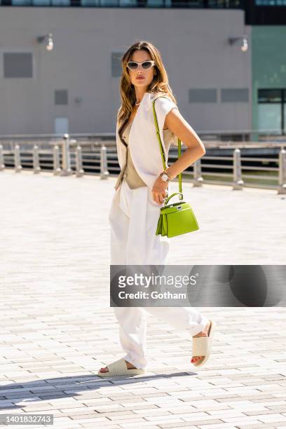 Alessandra Ambrosio is seen wearing a Maria Vittoria top, Madga Butrym pants with a Fendi handbag and Bottega Veneta shoes in Chelsea on June 08,...