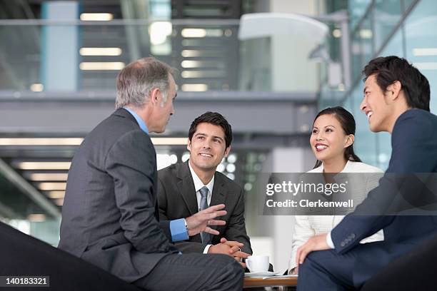 business people talking in meeting - persuasion stock pictures, royalty-free photos & images