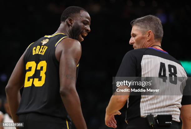 Draymond Green of the Golden State Warriors argues with referee Scott Foster in the second quarter during Game Three of the 2022 NBA Finals against...