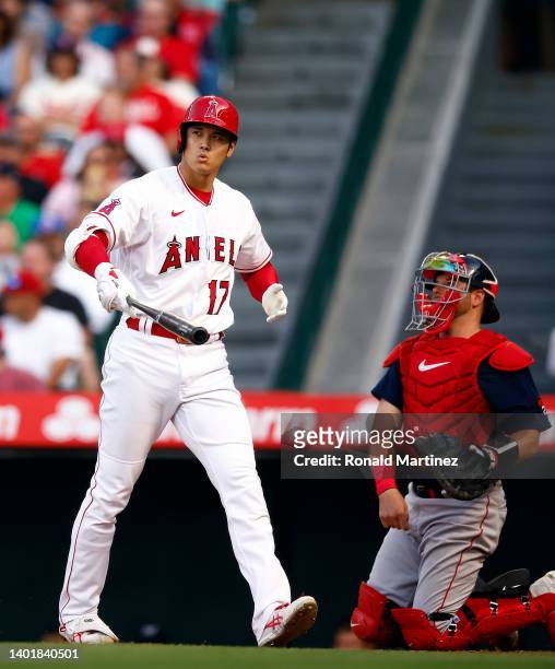 Shohei Ohtani of the Los Angeles Angels strikes out against the Boston Red Sox in the first inning at Angel Stadium of Anaheim on June 08, 2022 in...
