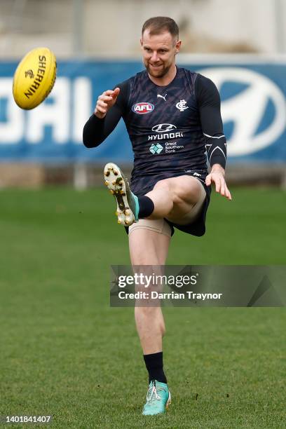 Sam Docherty of the Blues kicks the ball during a Carlton Blues AFL training session at Ikon Park on June 09, 2022 in Melbourne, Australia.