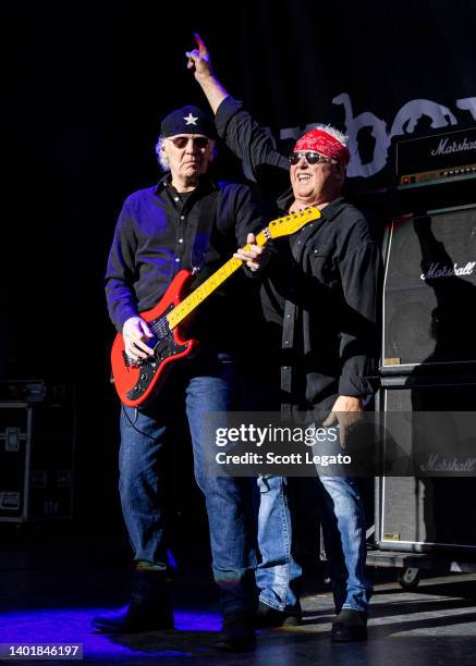 Paul Dean and Mike Reno of Loverboy performs at Pine Knob Music Theatre on June 08, 2022 in Clarkston, Michigan.