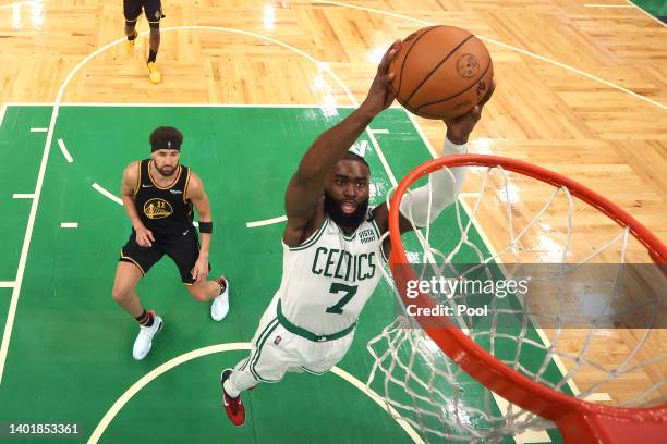 Jaylen Brown of the Boston Celtics dunks the ball against Klay Thompson of the Golden State Warriors in the third quarter during Game Three of the...