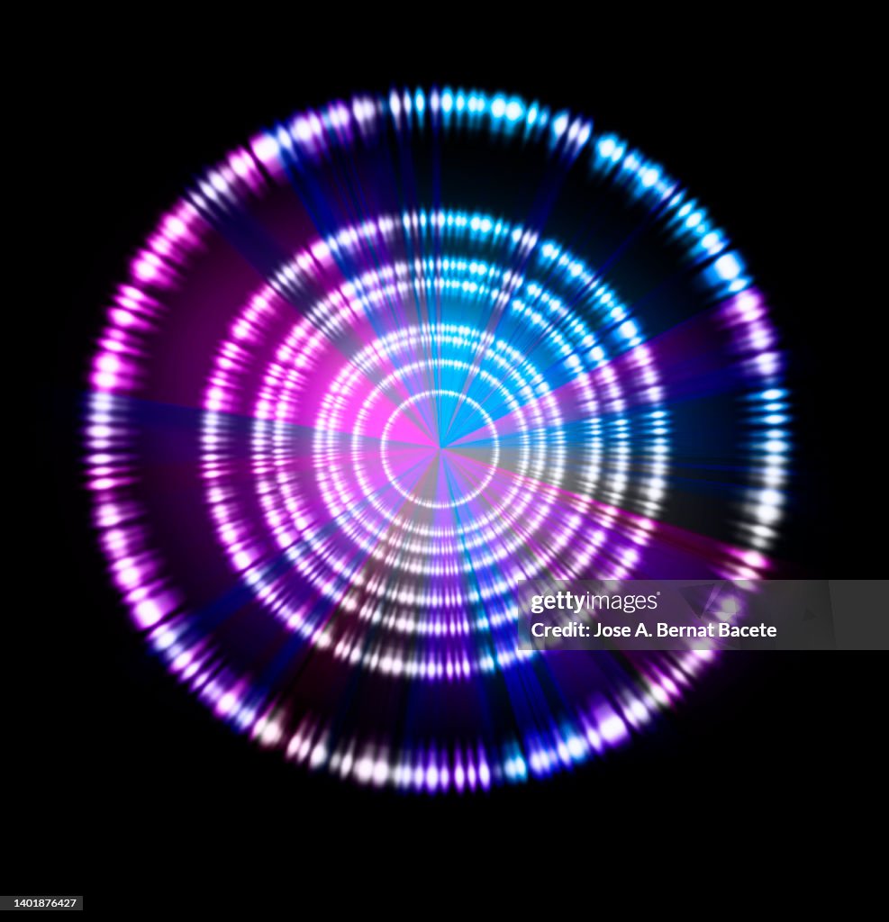 Concentric circles of a flash of light on a black background.