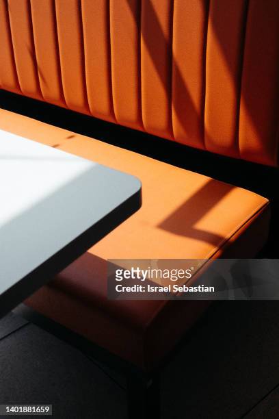 close-up view of the seat and table in a restaurant. - fastfood restaurant table stock-fotos und bilder