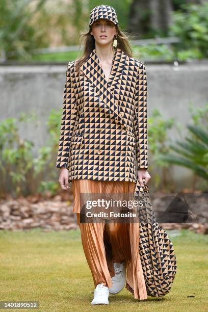 Model walks the runway during the Neriage fashion show as part of the Sao Paulo Fashion Week N53 on June 4 in Sao Paulo, Brazil.