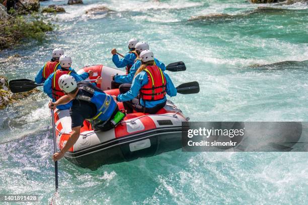 friends rafting in river - rafting stock pictures, royalty-free photos & images