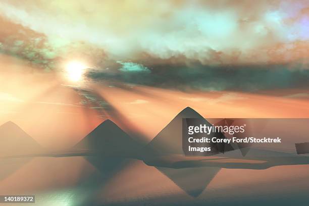 sunrays shine down on three pyramids along the nile river on the giza plateau. - tutankhamun stock illustrations