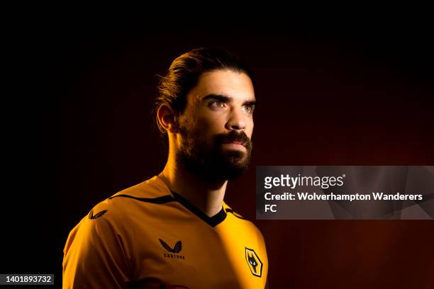Ruben Neves of Wolverhampton Wanderers poses for a portrait wearing the new 2022/23 Wolverhampton Wanderers Home Kit at The Sir Jack Hayward Training...