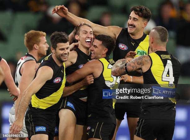 Judson Clarke of the Tigers celebrates after scoring his first goal in AFL, during the round 13 AFL match between the Richmond Tigers and the Port...