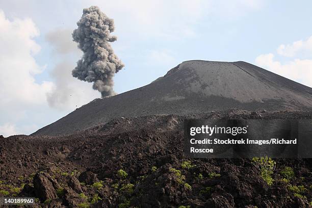 ash cloud from vulcanian eruption of anak krakatau volcano, sunda strait, java, indonesia. - anak krakatau stock-fotos und bilder