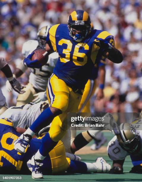 Jerome Bettis, Running Back for the St Louis Rams carries the ball during the National Football Conference West Division game against the New Orleans...