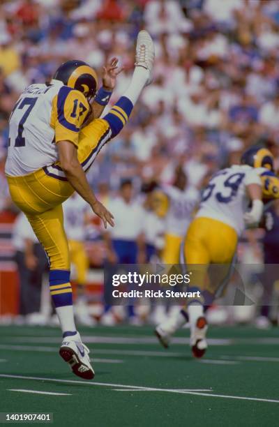 Don Bracken, Kicker and Punt Returner for the Los Angeles Rams punts the football upfield during the American Football Conference East Division game...