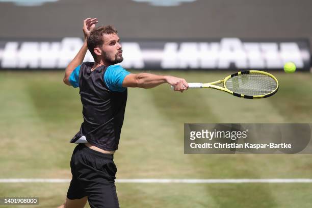 Oscar Otte of Germany plays a volley during the round of 16 match between Oscar Otte of Germany and Denis Shapovalov of Canada during day four of the...