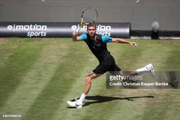 Oscar Otte of Germany plays a forehand during the round of 16 match between Oscar Otte of Germany and Denis Shapovalov of Canada during day four of...