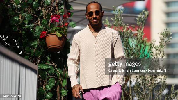 Lewis Hamilton of Great Britain and Mercedes looks on in the Paddock during previews ahead of the F1 Grand Prix of Azerbaijan at Baku City Circuit on...