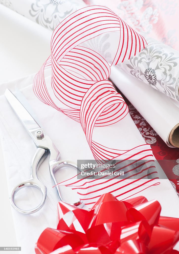 Wrapping paper, ribbon and scissors