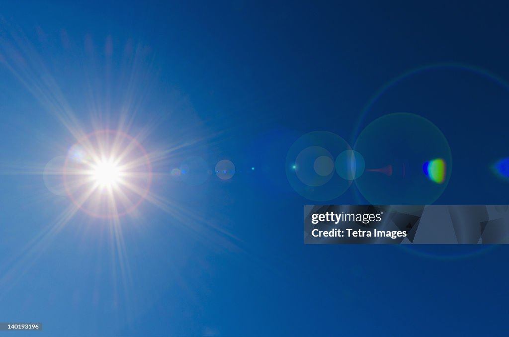 Blue sky with solar flare