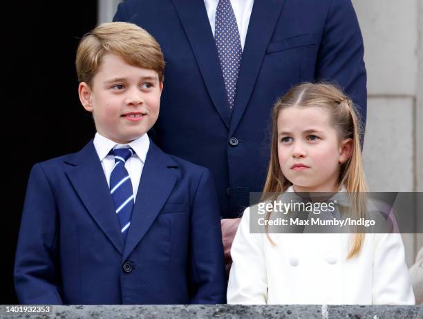 Prince George of Cambridge and Princess Charlotte of Cambridge stand on the balcony of Buckingham Palace following the Platinum Pageant on June 5,...