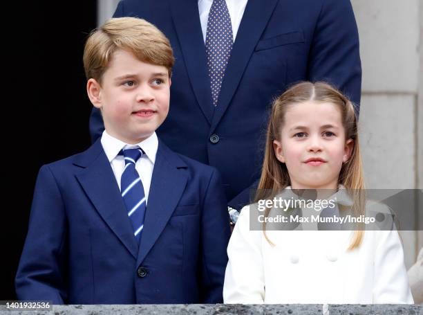 Prince George of Cambridge and Princess Charlotte of Cambridge stand on the balcony of Buckingham Palace following the Platinum Pageant on June 5,...