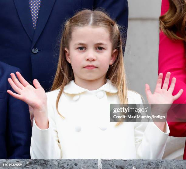 Princess Charlotte of Cambridge stands on the balcony of Buckingham Palace following the Platinum Pageant on June 5, 2022 in London, England. The...